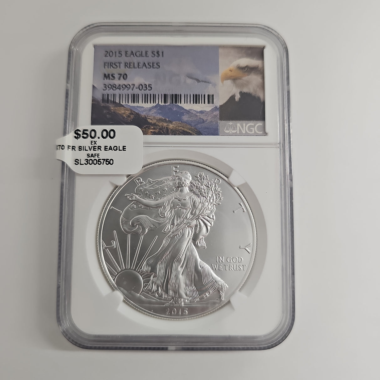 2015 EAGLE FIRST RELEASES S$1 NGC MS 70